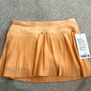 Never worn Lululemon tennis skirt, size 4! Price on tag was $88, selling for $35